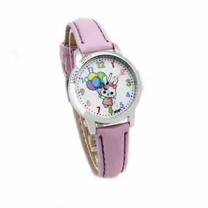 Detail of pink leather strap and watch face with cute rabbit and colorful numbers