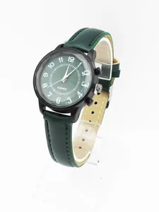 Detail of dark green quartz watch with black metal case and leather strap on a stand