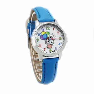 Detailed macro of kids quartz watch with rabbit, balloon dial and blue leather strap