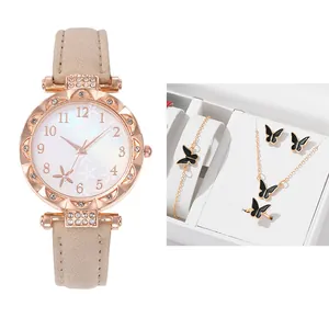 Women's rose gold watch and black butterfly jewelry gift set in a white box