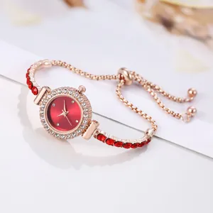 Elegant women's quartz bracelet watch with red sunray dial and rose gold rhinestone band