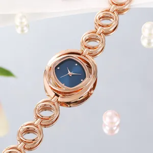 Luxe Dames Armbandhorloge Met Hol Bloemontwerp En Strass Wijzerplaat Elegante Gelegeerde Metalen Band Kwartshorloge Voor Vrouwen