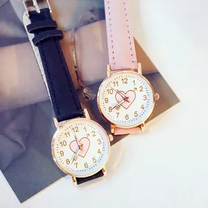 Fashionable women's heart motif watches with rose gold cases and matte leather straps