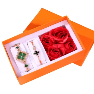 Women's rose gold lucky clover watch and bracelet set with diamonds in a luxury gift box