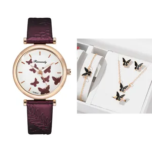 Women's quartz watch and butterfly jewelry set with purple strap and gold finish