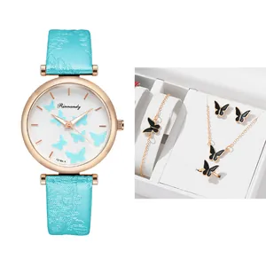 Detailed set of butterfly quartz watch with matching necklace and earrings in a gift box