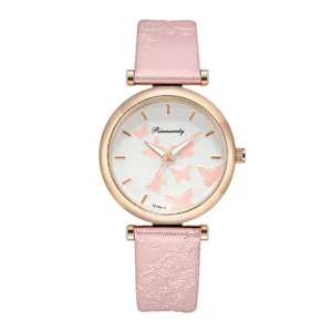 Detailed view of women's quartz watch dial with pink butterfly patterns and rose gold case