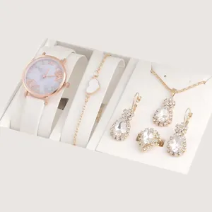 5-delige set met roségouden horloge, bloemige wijzerplaat en kristallen sieradenset