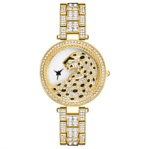 Reloj de cuarzo de lujo para mujer en oro con esfera de leopardo y correa de cristales