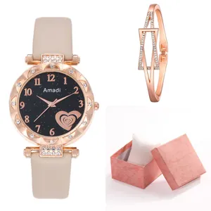 Classic rose gold watch with white leather strap and matching geometric bracelet set