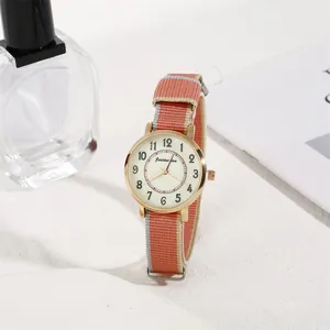 Women's minimalist gold watch with cream dial and striped nylon NATO strap