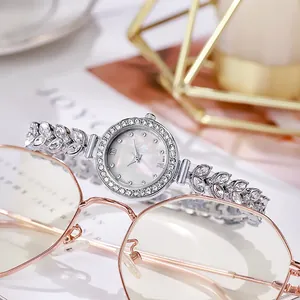 Women's quartz silver bracelet watch with zircon leaf strap and mother of pearl dial