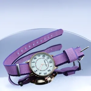 Women's quartz watch with rose gold case and purple striped nylon NATO strap