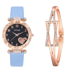 Detail view of rose gold quartz watch with starry sky dial and matching crystal bracelet
