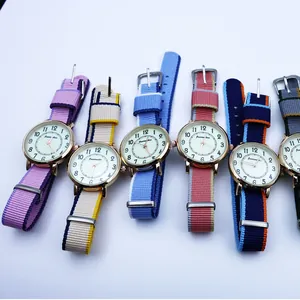 Detailed set of six quartz watches featuring colorful NATO nylon straps and gold-toned cases