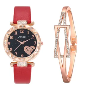 Detailed view of red leather watch with rose gold crystal bezel and matching bracelet