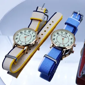 Luminous quartz watch with colorful nylon strap and gold-tone case for casual sport