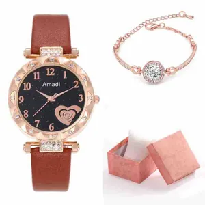 Montre femme or rose cadran étoilé avec bracelet en cuir et cristal dans coffret cadeau
