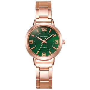 Montre à quartz pour femme en or rose avec cadran vert émeraude et bracelet en acier poli