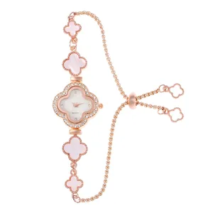 Detail of clover quartz watch with rose gold strap and adjustable drawstring closure