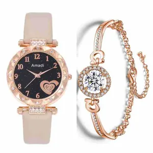 Gros plan sur la montre à cadran ciel étoilé et le bracelet en or rose serti