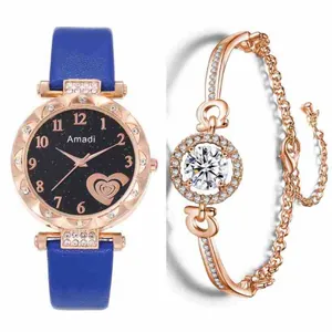 Détail d'une montre en or rose avec cadran étoilé et ensemble de bracelets en cristal