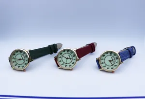 Detail of colorful woven straps and luminous dials for minimalist quartz watches