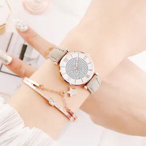 Elegante roségouden horlogeset met strass wijzerplaat en bijpassende sterarmband