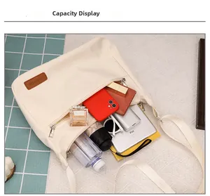 Top view of large nylon crossbody bag interior showing storage space for iPad and essentials