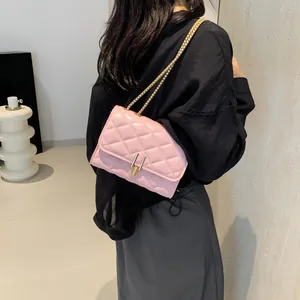 Pink quilted chain crossbody bag for women with gold clasp and elegant square shape