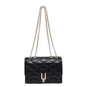 Elegant black quilted crossbody chain bag with golden lock and classic diamond pattern