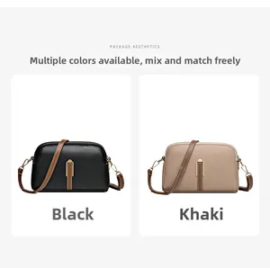 Detailed comparison of black and khaki shell bags with pebbled leather and gold hardware
