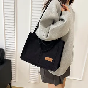 Large capacity black corduroy tote bag with fashion leather tag for casual daily wear