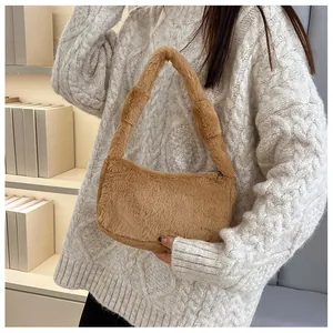 Chic caramel plush shoulder bag shown being worn for a cozy autumn fashion style