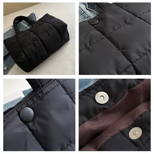 Détails macro du sac cabas matelassé noir avec fermoir magnétique et doublure interne