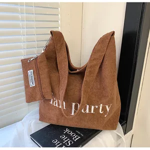 Braune Cord-Shopper-Tasche mit kleiner Innentasche und Fan Party-Schriftzug