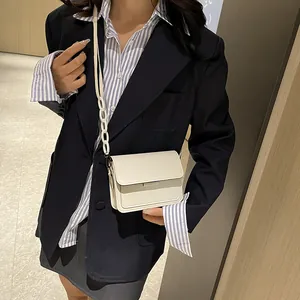 Minimalist cream white rectangular crossbody bag with stylish plastic chain strap
