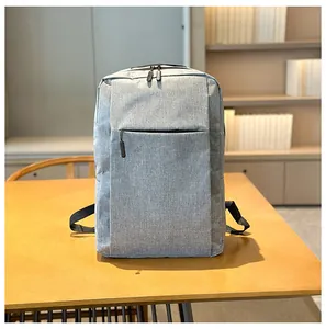 Detail of grey business backpack with hidden zipper pocket and textured oxford fabric