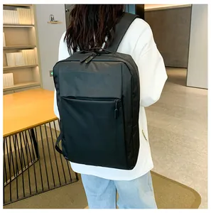 Detailed back view of a black business laptop backpack showing fit and large capacity