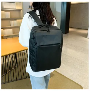 Side view of black business laptop backpack with padded shoulder straps for comfort