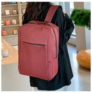 Deep burgundy business laptop backpack with large capacity and matte durable fabric