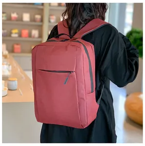 Rear view of burgundy business laptop backpack with hidden zipper and padded straps