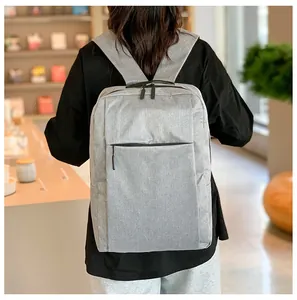 Close-up of light grey modern business laptop backpack with water-resistant fabric texture