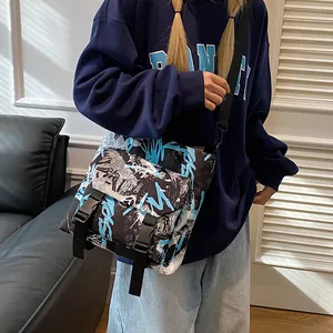 Streetwear nylon messenger bag with blue graffiti print and adjustable buckle straps