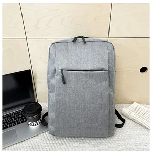 Detailed view of the gray business laptop backpack featuring durable fabric texture