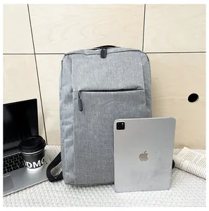 Grey business laptop backpack with waterproof fabric and front horizontal zipper pocket