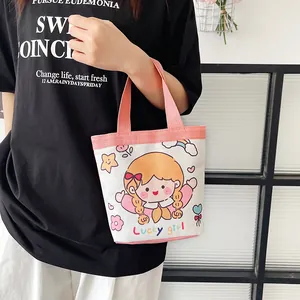 Süße Cartoon-Minihandtasche aus Leinwand für Mädchen mit Print und rosa Griffen