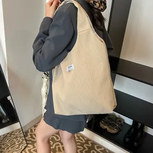 Large capacity corduroy tote bag in khaki with fashion label for daily commuting