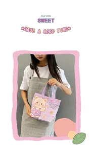 Detail of purple canvas gift bag with lucky baby cartoon bear and snap button closure