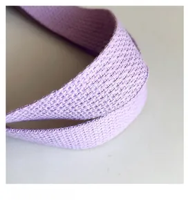 Macro detail of soft purple woven handle texture on this stylish gift canvas bag